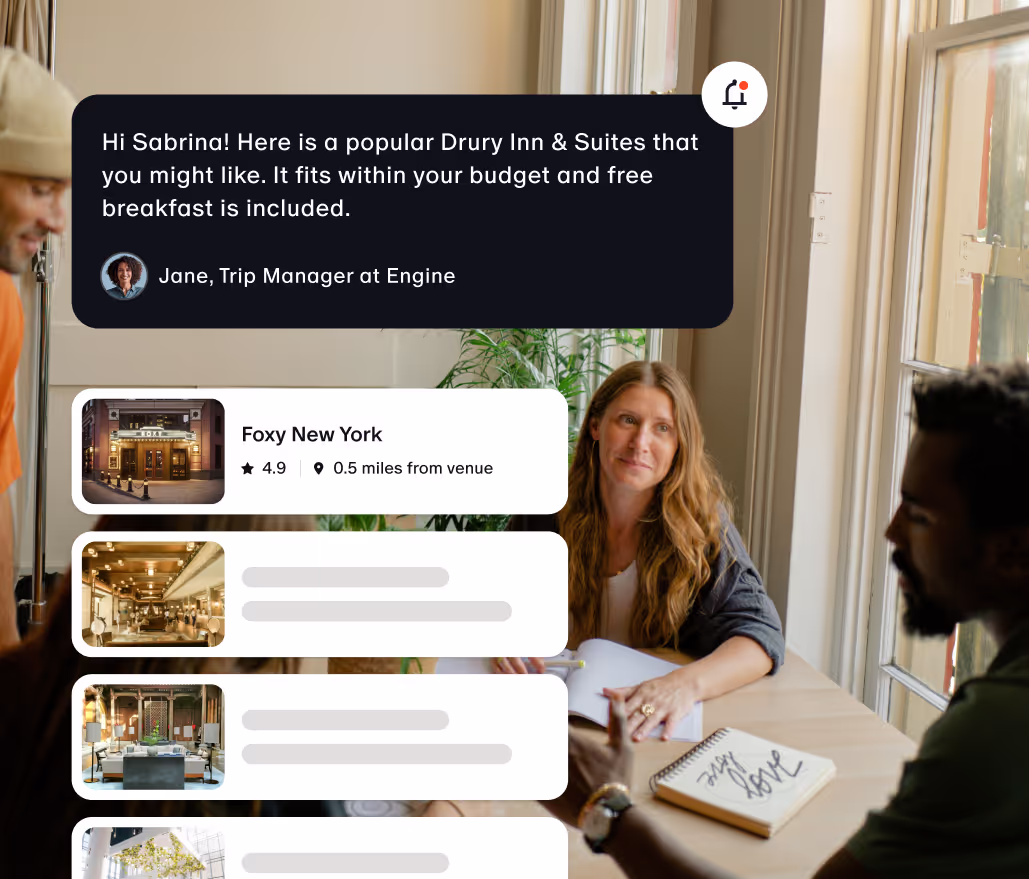 Office workers talking, and making a hotel booking