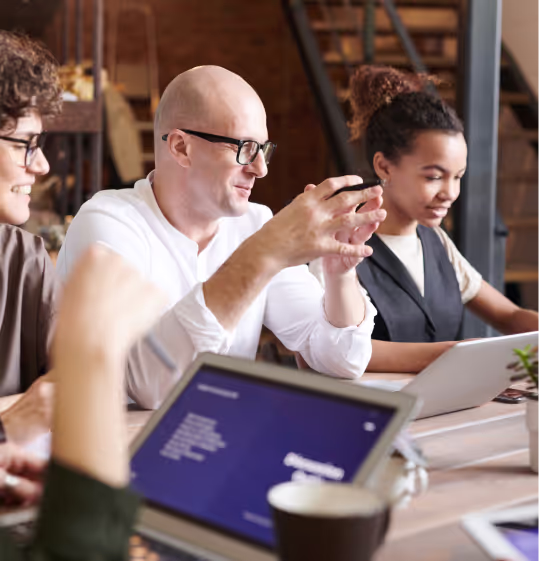 A group of people at a work meeting